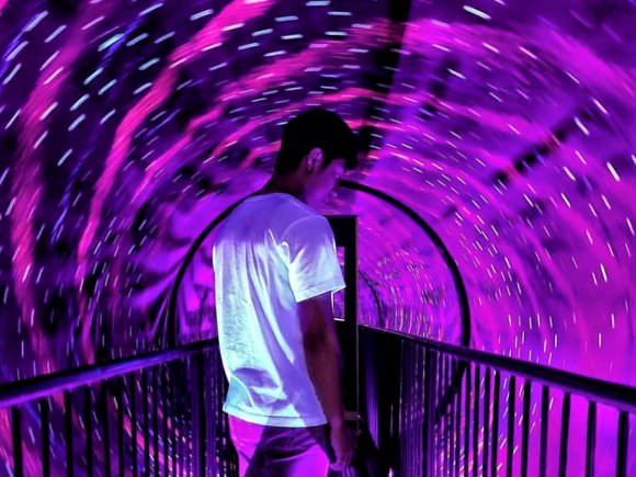 Man in a bright tunnel